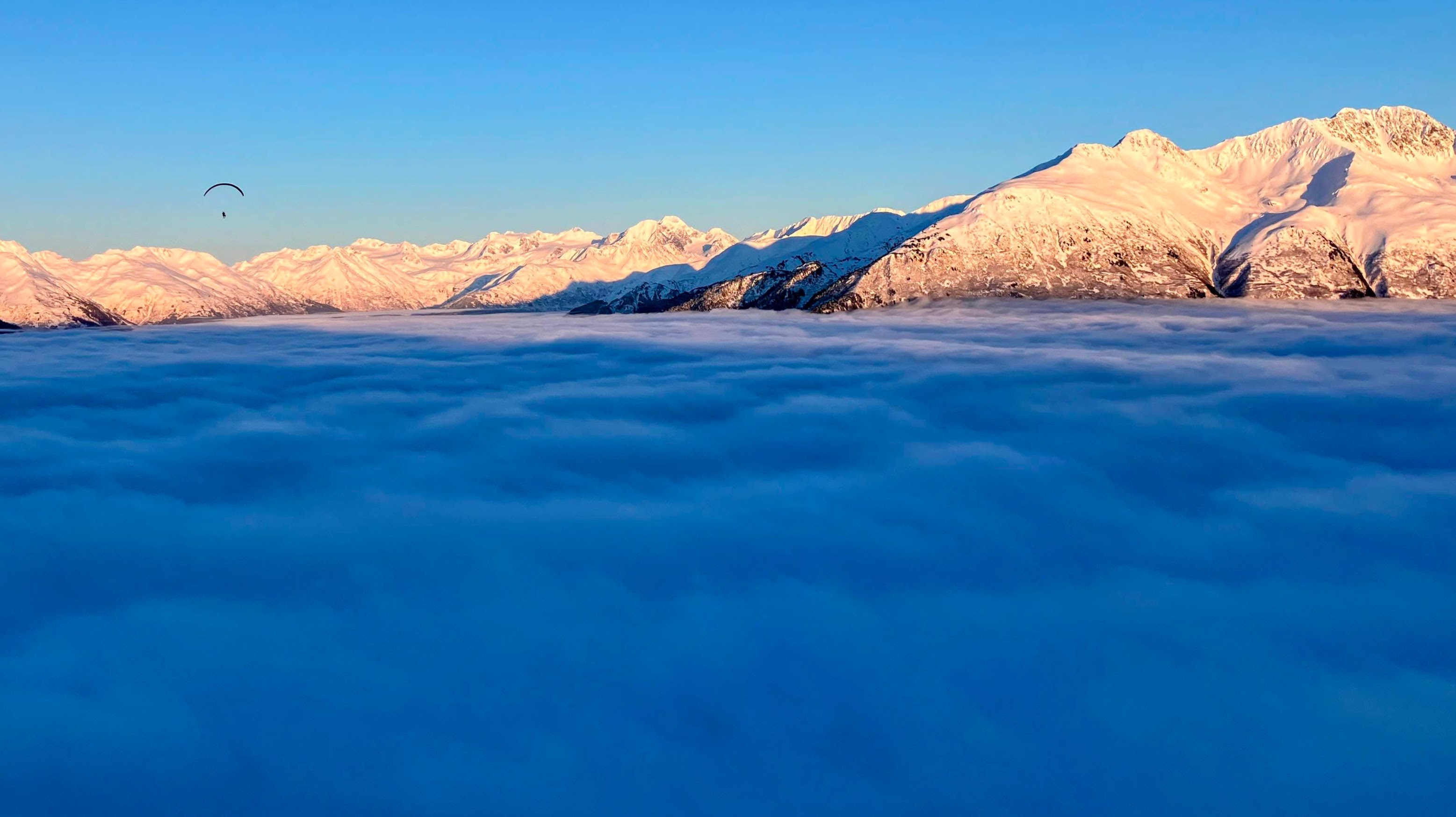 Mountain landscape with paraglider